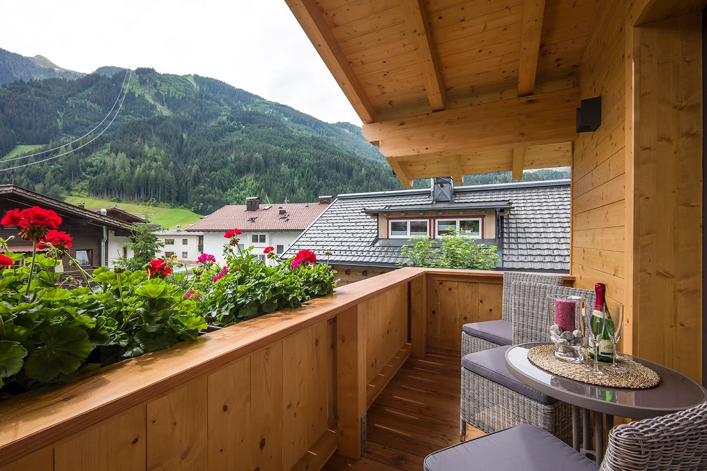 Balcony with dreamlike view of the Zillertal mountains and two chairs