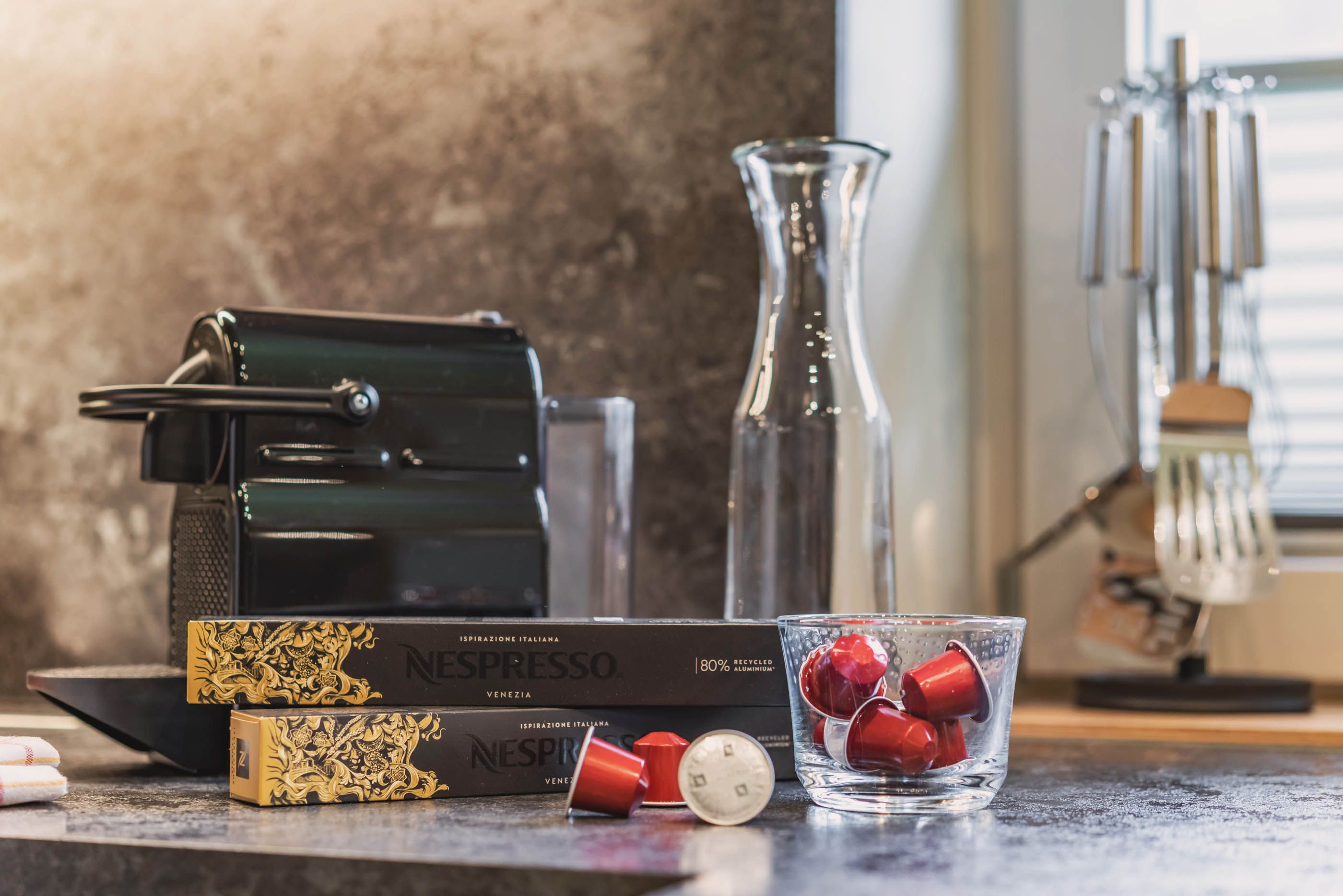 High-quality coffee machine with Nespresso capsules and accessories for perfect coffee