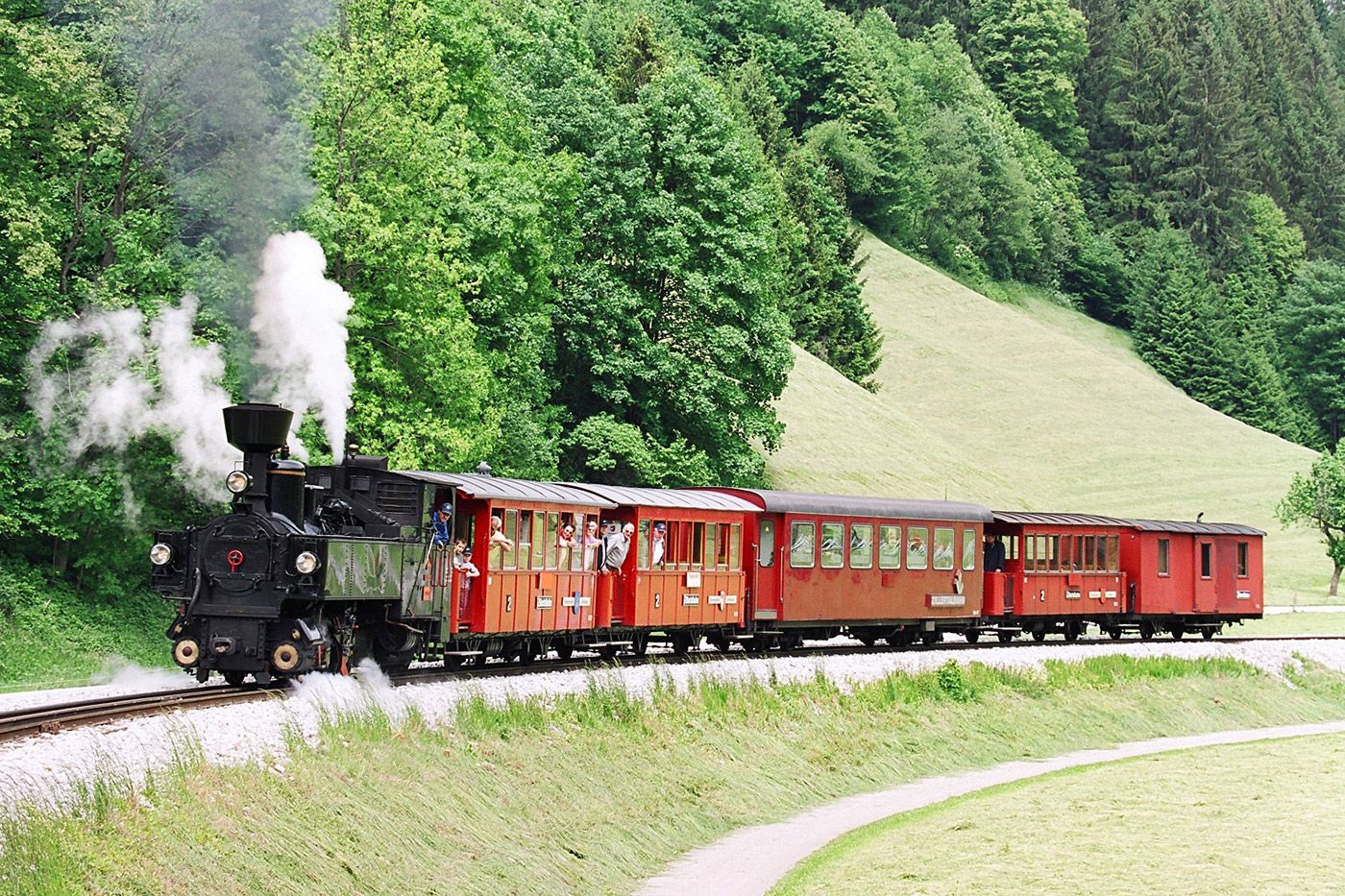 Nostalgic steam train of the Zillertalbahn on the Zeller Bridge